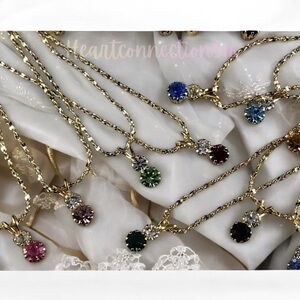 Elegant Gold Pendant Necklace with Multicolor Gemstones